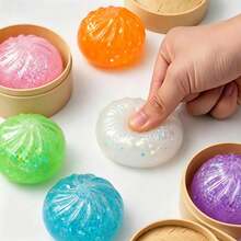 1 cái bóng bóp mềm hình bánh bao lấp lánh nhiều màu sắc, màu ngẫu nhiên, có thể tháo rời, dùng để giảm áp lực. Có hai kiểu dáng và màu sắc được gửi ngẫu nhiên. - Nhiều màu - Xem 6