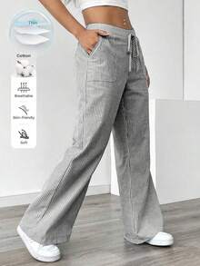 Pantalones sueltos para mujer con rayas azules de tiro bajo para vacaciones y uso informal - Negro - Ver 1