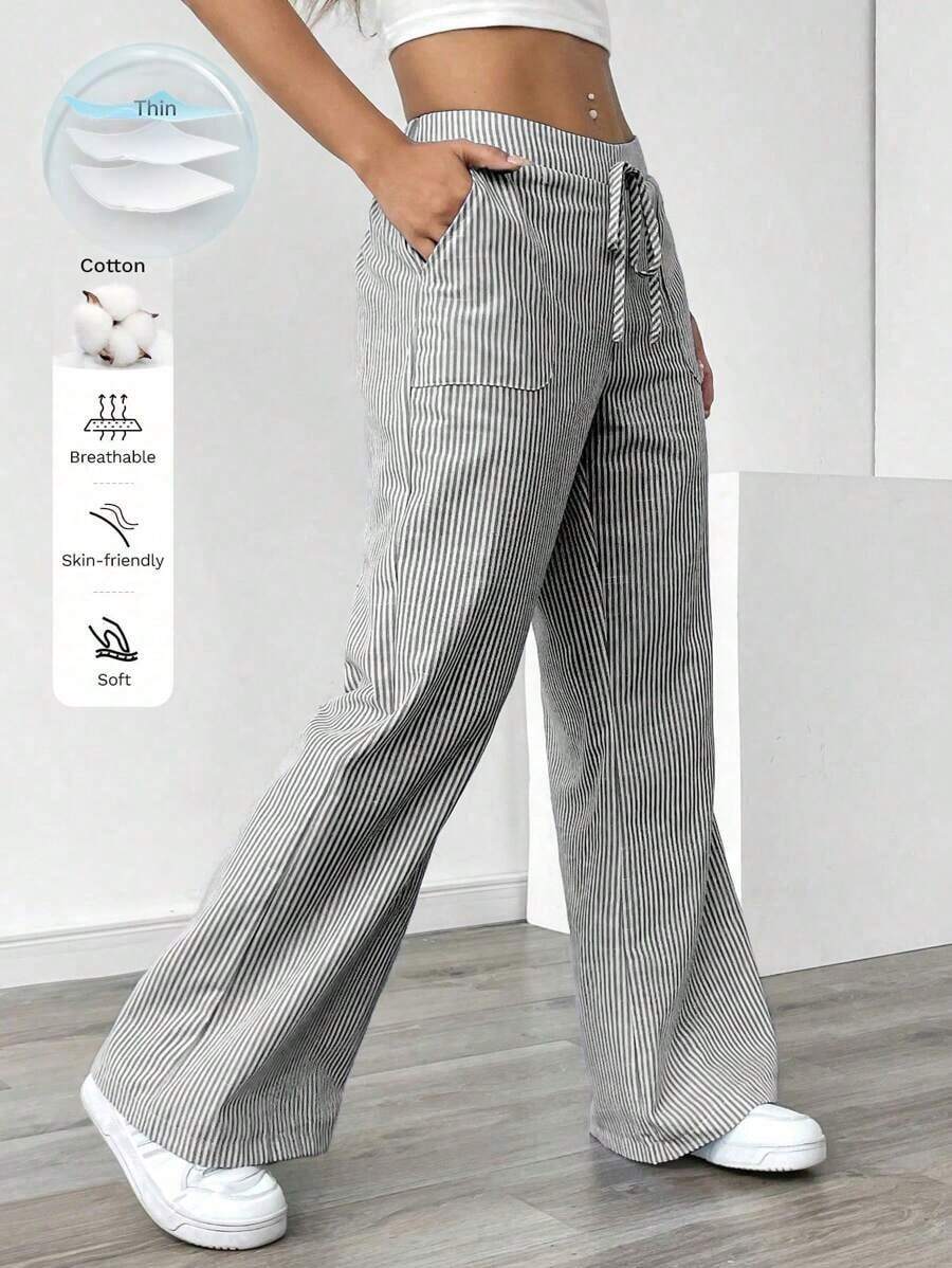 Pantalones sueltos para mujer con rayas azules de tiro bajo para vacaciones y uso informal - Negro - Ver 1