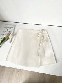 Falda de tela texturizada de estilo ancho, asimétrica y con tirantes, de estilo casual y versátil para graduación, primavera y verano - Albaricoque - Ver 1