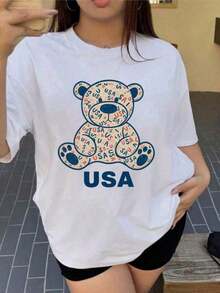 Camiseta de algodón puro de manga corta, novedad de verano 2026 - Oso Americano, Temática Patriótica - Camiseta estampada de primavera y verano para mujer, un artículo de moda con un diseño clásico de cuello redondo - Camiseta unisex de algodón holgada de manga corta y cuello redondo, estilo vintage urbano, informal, versátil y cómoda. - Blanco - Ver 6