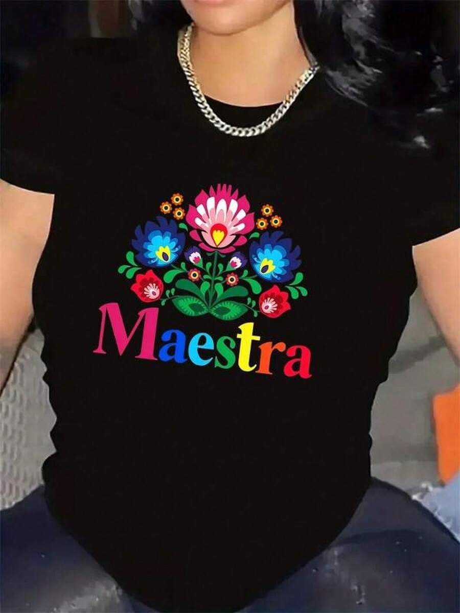 Camiseta de Mujer con Diseño Floral Español de Maestra - Top Casual Ligero de Manga Corta y Cuello Redondo con Estampado Floral Colorido y Texto en Español, Ajuste Cómodo para Uso Diario, en Casa o en Restaurantes, Camiseta de Profesora, Tejido Duradero - Negro - Ver 1