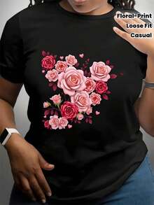 Camiseta unisex negra con estampado floral para hombres y mujeres, con diseño de rosa rosa y corazón - Hecha de tela suave de 180 g/m², corte holgado, cuello redondo y mangas cortas, perfecta para salidas casuales y fiestas. - Negro - Ver 1