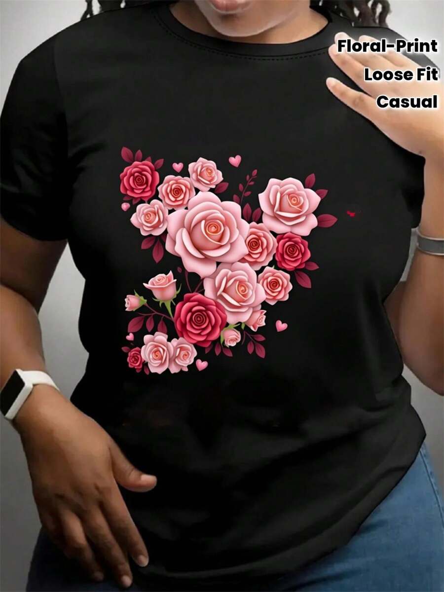 Camiseta unisex negra con estampado floral para hombres y mujeres, con diseño de rosa rosa y corazón - Hecha de tela suave de 180 g/m², corte holgado, cuello redondo y mangas cortas, perfecta para salidas casuales y fiestas. - Negro - Ver 1
