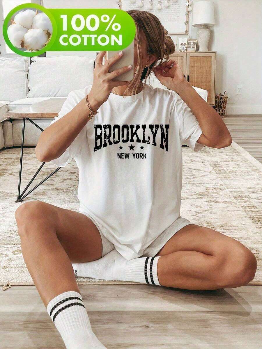 Camiseta de manga corta con cuello redondo y estampado para mujer, hecha de tela de algodón puro. Con un diseño clásico y minimalista de cuello redondo, es fácil de combinar y adecuado para todo tipo de cuerpos. Una opción ideal para citas, desplazamientos diarios y salidas informales. - Blanco - Ver 1