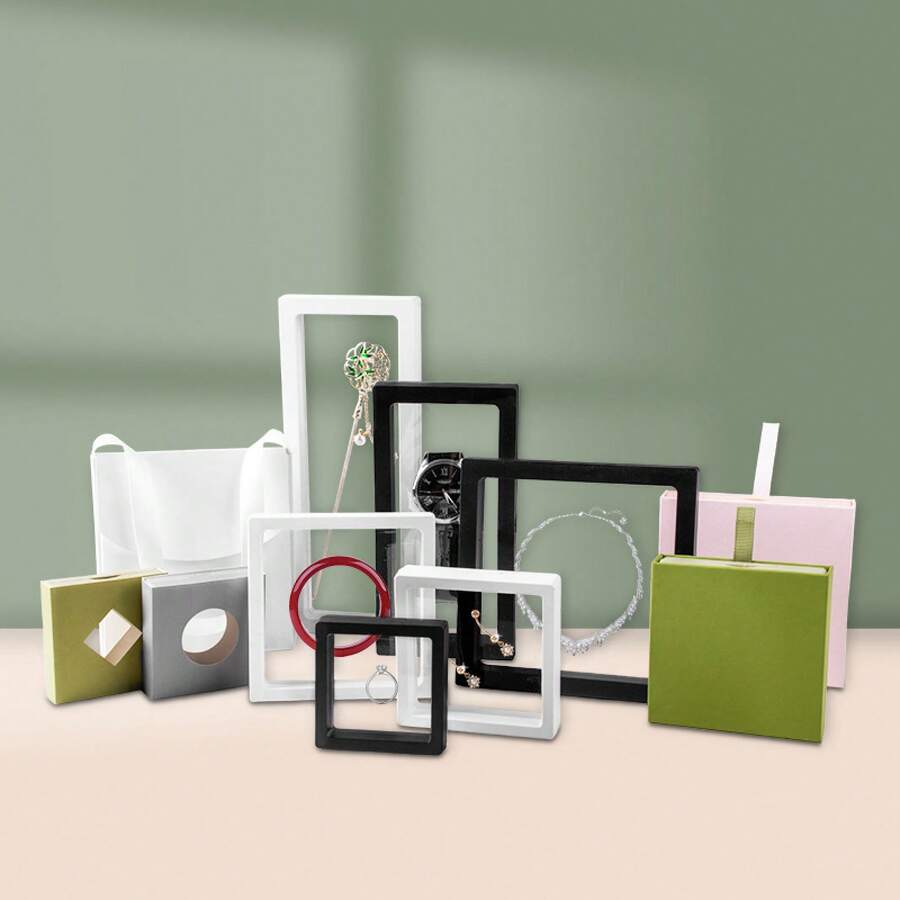 A Transparent Film Suspended Jewelry Packaging Display Box, Available In Multiple Colors, Includes A Matching Paper Outer Box. It Can Store Rings, Earrings, Bracelets, And Other Types Of Jewelry. Features Scratch-Resistant And Dust-Proof Design, Combining The Functions Of Store Display And Holiday Gift Packaging. A Simple And Practical Universal Jewelry Storage Box - White Film Box; 11*11 - View 1