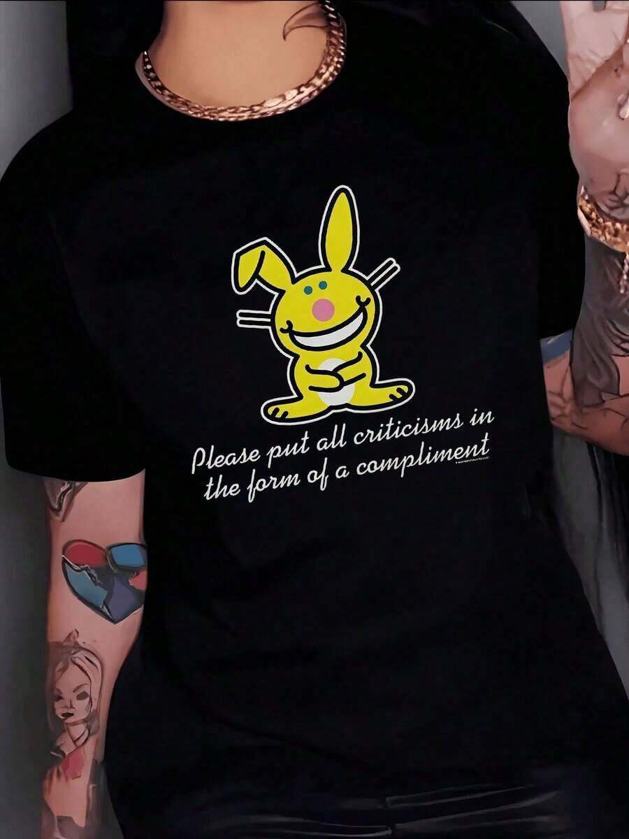 Women's 100% Cotton T-Shirt. Smiling Yellow Rabbit With Long Ears Conveying A Positive And Encouraging Message To Face Criticism With Humor. Women's T-Shirt. 100% Cotton. - Hitam - View 1