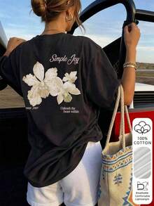 This Short-Sleeve Crew Neck T-Shirt With A Colorful Letter And Floral Print Is A Fashionable And Versatile Choice For Women In Summer. The Graphic Tee Comes In White And Pink, Perfect For Vacation Wear. 100% Cotton - 黑色 - 查看 1