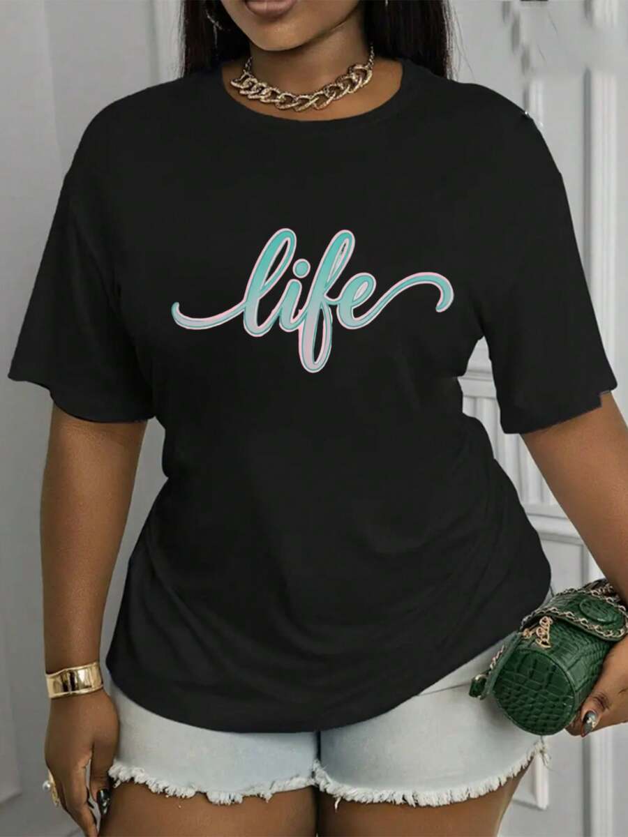 Camiseta Estampada para Mujer con Diseño Gráfico - Camiseta Casual de Manga Corta y Cuello Redondo en Estilo Versátil. Con un Corte Relajado para Todas las Estaciones, Perfecta para el Uso Diario o tus Atuendos de Vacaciones (Lavable aáquina). Combínala con Shorts de y un Elegante Bolso Verde de Cocodrilo para un Look Chic. - Negro - Ver 1