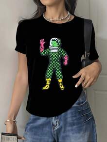 Astronaut Figure In Green Plaid Suit Symbolizes The Spirit Of Human Exploration, Curiosity About The Universe, And Feminine Inner Strength. Modern, Comfortable, And Versatile Women's T-Shirt - Black - View 1