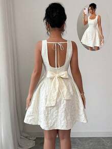 Vestido corto de mujer con textura jacquard color albaricoque, espalda descubierta y cierre con lazo en la cintura - Albaricoque - Ver 2