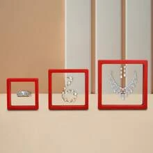 A Transparent Film Suspended Jewelry Packaging Display Box, Available In Multiple Colors, Includes A Matching Paper Outer Box. It Can Store Rings, Earrings, Bracelets, And Other Types Of Jewelry. Features Scratch-Resistant And Dust-Proof Design, Combining The Functions Of Store Display And Holiday Gift Packaging. A Simple And Practical Universal Jewelry Storage Box - White Film Box; 11*11 - View 9