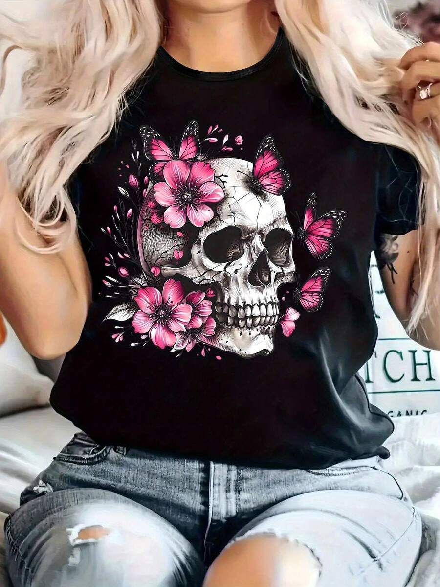 Camiseta de verano para mujer Camiseta con estampado de calavera, flores y mariposas, diseño con calavera sobre fondo rodeada de flores rosas y mariposas en tonos rosa y , gran nivel de detalle y contraste llamativo, estilo que mezcla lo oscuro y lo femenino, elaborada conécnica de transfer de alta definición, para un look moderno y atractivo - Blanco - Ver 1