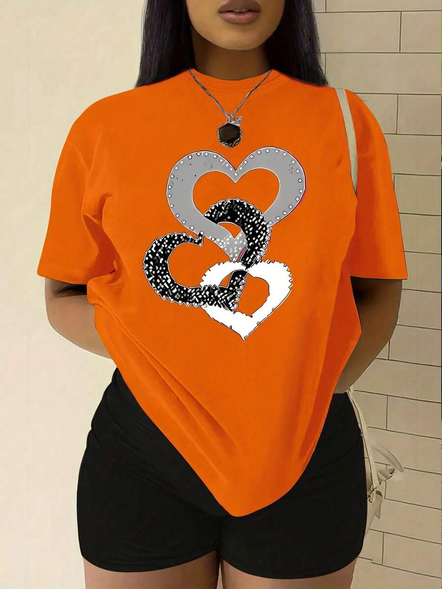 Nueva camiseta de manga corta para mujer, primavera/verano 2025, sencilla y elegante con estampado de anillos en forma de corazón, camiseta versátil de cuello redondo para uso diario, diseño circular - fácil de lavar y mantener para el uso cotidiano.