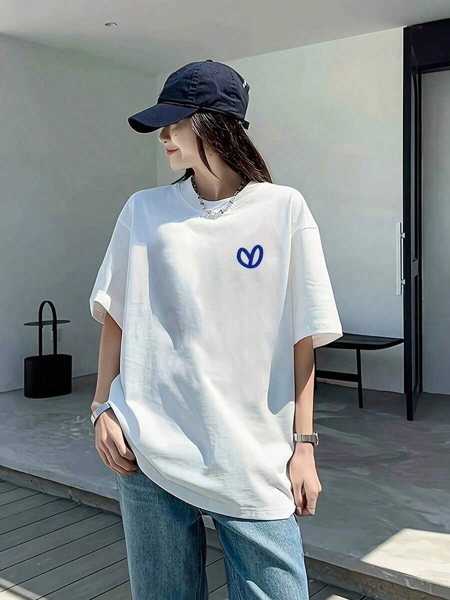 Moda 2026 Para Mujer, Camiseta de Algodón Casual de Calidad, Ropa Diaria Casual Japonesa y Coreana, Tallas Grandes Especiales para Mujer, Extra Ancha y Grande, Estilo Hip-Hop Urbano Coreano, Camiseta Holgada de Color Sólido con Estampado por Transferencia de Calor, Moda Japonesa y Coreana, Top Versátil de Mujer con Hombros Caídos, Jersey de Cuello Redondo, Transpirable para Verano, Efecto Adelgazante para el Trabajo Diario, Color Sólido para Estudiantes y Jóvenes Chicas, Camiseta Casual Blanca de Manga Corta, Camisetas Gráficas, Camiseta Básica Unisex - Blanco - Ver 1