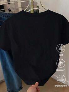 Camiseta de manga corta de moda primavera-verano 2026, fabricada en México. Estampado con diseños de dibujos animados, estilo para parejas, adecuado para uso en interiores y exteriores. Paquete de una sola pieza, cuello redondo clásico, diseño unisex, ideal para ocasiones de oficina y casuales. - Negro - Ver 4