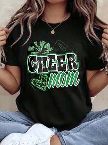 "Cheer Mom" T-Shirt With Green Leopard Print And Pom-Pom Design For Cheerleader Moms, St. Patrick's Day Gift, 220g - Urban Vintage Style, Unisex, Cotton, Short Sleeve, Round Neck, 100% Cotton. - 黑色 - 查看 1
