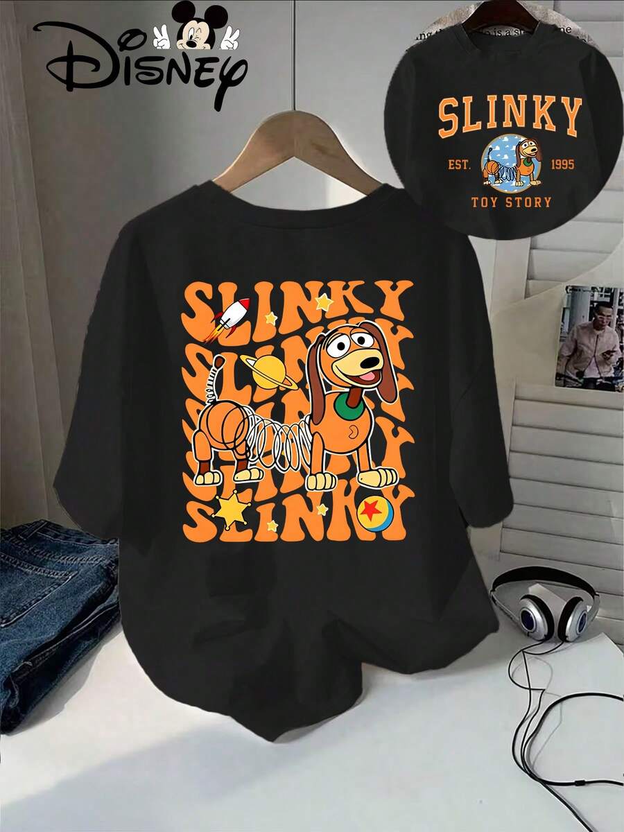 Talla grande, ropa de verano auténtica de Disney para mujeres con el personaje Slinky Dog de Toy Story, con estampado de dibujos animados, incluyendo el texto "SLINKY", establecido en 1995 y el logotipo de TOY STORY - Nueva camiseta de manga corta de verano para mujer, camiseta estampada casual y de moda - Negro - Ver 1