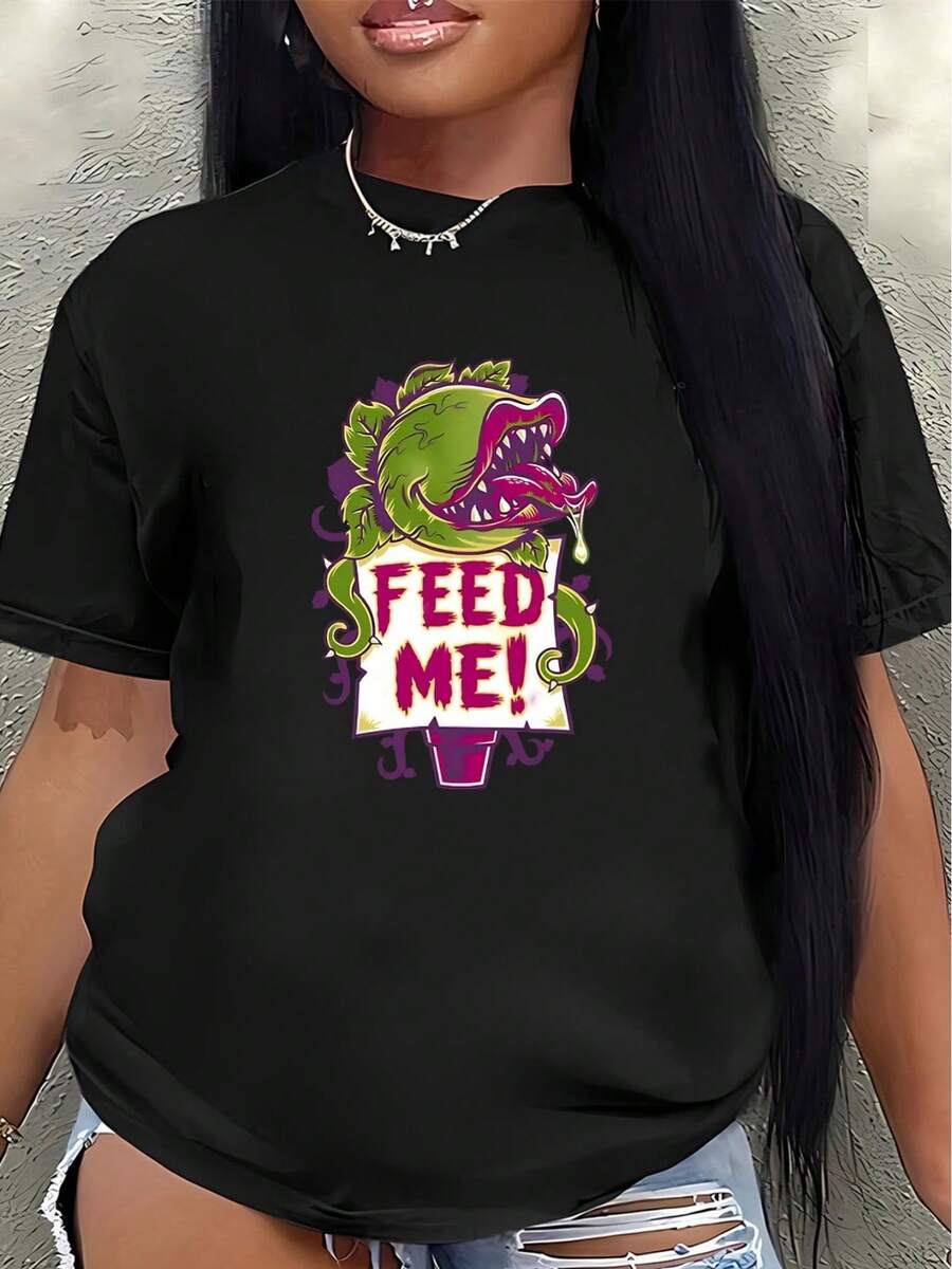 Camiseta de manga corta, ligera y duradera, estampada con un diseño de plantas con la frase "feed me", perfecta para descansar en casa o salir a comer, ofreciendo comodidad diaria.blusas para mujer>ropa - Negro - Ver 1