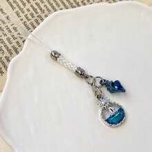 1 pièce Charm de tour de cou de téléphone en forme de cœur océanique, sangle de téléphone design de niche, pendentif doux et polyvalent, mini accessoire élégant convenant aux smartphones - Bleu azur - Voir 12
