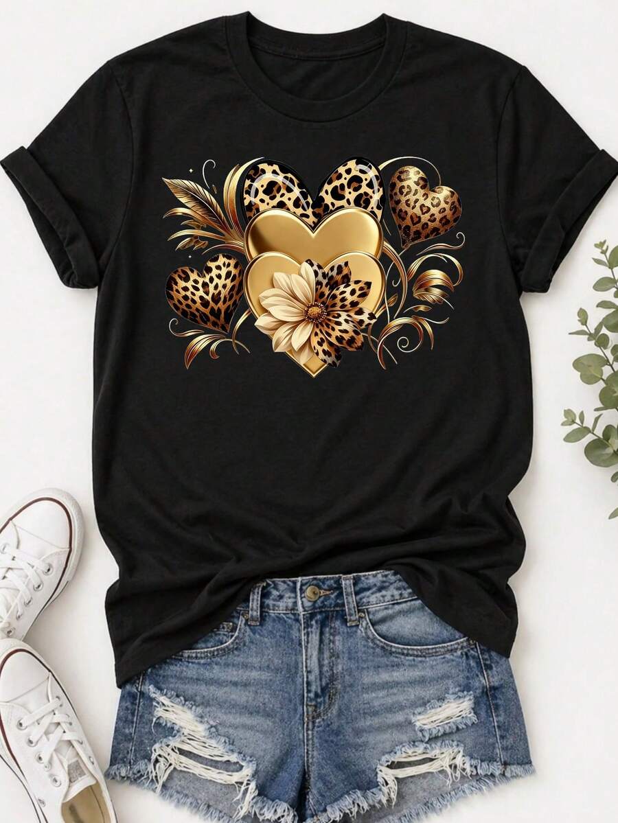 Camiseta estampada para mujer - camiseta casual de manga corta y cuello redondo en negro con diseño de corazón de leopardo dorado. Con un corte relajado para todas las estaciones, perfecta para el uso diario y atuendos de vacaciones (lavable aáquina). - Negro - Ver 1