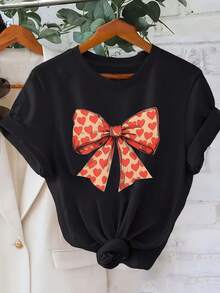 1 pieza de camiseta de moda casual para mujer de talla grande, estilo vintage dulce, con estampado de lazo en forma de corazón, cuello redondo, para primavera-verano. Prenda creativa, cómoda para uso diario y salidas, sensación relajada, 100% algodón de 180g. - Negro - Ver 6