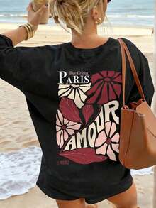 Camiseta de manga corta con cuello redondo y estampado floral "Paris Lover" en color crema para mujer, corte holgado informal, estilo parisino, estilo romántico, para paseos por la ciudad, citas nocturnas, temporada de flores de cerezo, ideal para brunch, primavera/verano. - Negro - Ver 6