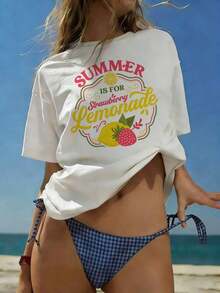 Playera oversize blanca para mujer, cuello redondo manga corta, lindo estampado de fresa y limonada, estilo súper cómodo y relajado, ideal para verano, paseos, playa y vacaciones con look casual a la moda 29VR - Blanco - Ver 1