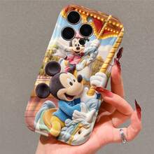 Officially Licensed Disney Mickey Mouse & Minnie Mouse Phone Case, This Protective Phone Case Features A Joyful Print Of Mickey And Minnie Riding Pastel‑Toned Carousel Horses, Waving Cheerfully Against A Bright Amusement Park Background With Glowing String Lights And Soft Cloud Accents, Made With Flexible, Durable TPU Material To Protect Against Everyday Scratches, Bumps, And Minor Impacts, With A Raised Camera Frame For Extra Lens Protection, Slim And Lightweight Construction That Adds Minimal Bulk And Fits Easily In Pockets And Bags, Compatible With IPhone 17, 16, 15, 14, 13, 12, 11 Pro Models, Making It A Timeless Choice For Disney Fans, Ideal For Birthdays, Holidays, Or Any Special Occasion To Surprise Family And Friends. - trắng - Xem 4
