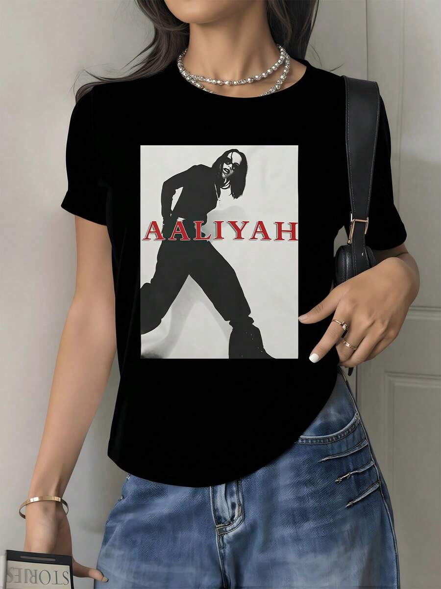 A Confident Female Figure Symbolizes Freedom, Confidence, And A Modern Attitude, With Red Typography Highlighting Youthful Energy And Urban Style. This Comfortable, Casual Women's T-Shirt Is Perfect For Everyday Wear. - 黑色 - 查看 1