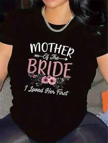 Camiseta de manga corta de algodón para la madre de la novia, duradera y cómoda, adecuada para bodas, banquetes, fiestas o reuniones familiares, decorada con patrones florales y palabras inspiradoras, es el regalo perfecto para ocasiones especiales. - Negro - Ver 1