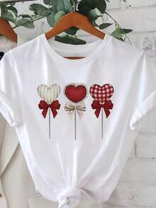1 pieza de camiseta blanca para mujer con estampado de corazón y lazo, cuello redondo, camiseta casual de algodón, tejido de punto de elasticidad media, corte regular para damas, ideal para primavera/verano/otoño. - Blanco - Ver 1