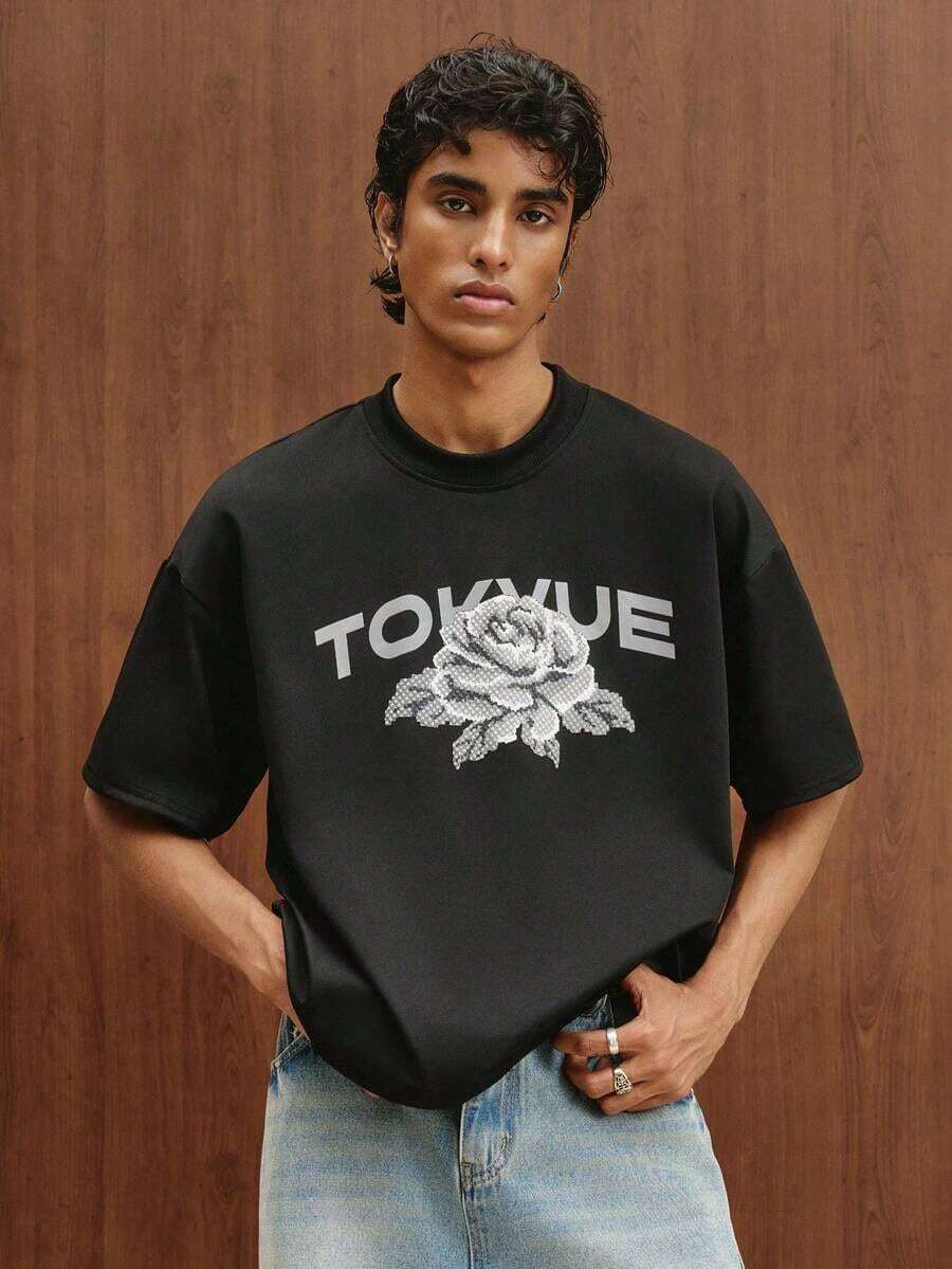 Camiseta de manga corta con estampado floral en relieve, estilo urbano, para hombres y mujeres, adecuada para actividades al aire libre, festivales de música, uso diario y reuniones con amigos. - Negro 2 - Ver 1