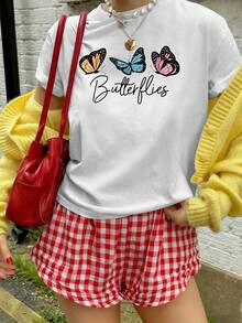 Camiseta premium para mujer con estampado de mariposas, estampado de mariposas coloridas, top casual de manga corta y corte holgado, ecológica. - Blanco - Ver 2