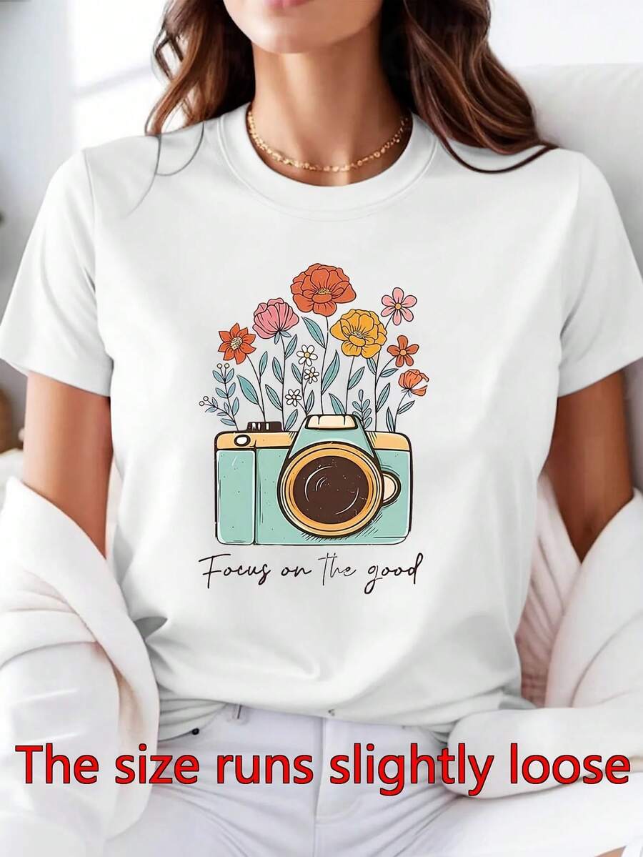 Camiseta Vintage para Mujer con Diseño de Cámara y Fotografía - Lema "Enfócate en lo Bueno", Camiseta Ligera de Poliéster con Cuello Redondo y Manga Corta, Diseño de Cámara Retro, Estilo Blusa para Primavera/Verano, Ideal para Sesiones de Fotos y Atuendos Casuales (Lavable a Máquina) - Blanco - Ver 1