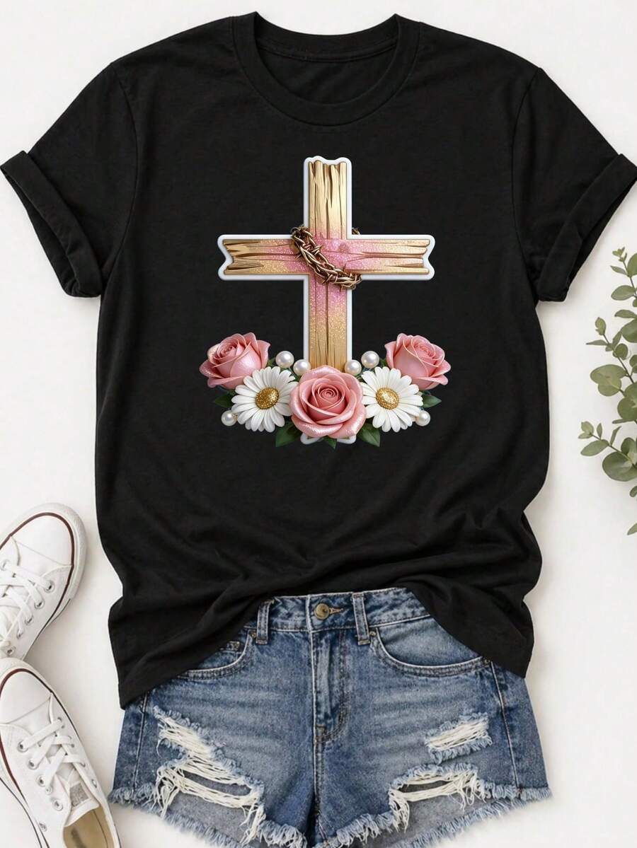 Camiseta estampada para mujer - camiseta casual de manga corta y cuello redondo en negro con elegante cruz dorada y rosas rosadas. Con un corte relajado para todas las estaciones, perfecta para el uso diario y atuendos de vacaciones (lavable aáquina). - Negro - Ver 1