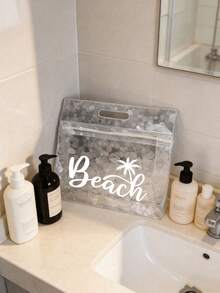 这款透明防水洗漱包印有白色“Beach”字样和棕榈树图案，可收纳洗发水、乳液、化妆品等。时尚实用，适合旅行、通勤、学生和爱美人士使用，可用于旅行、健身、酒店住宿和日常浴室收纳。用途广泛，也可作为化妆包使用。 - 彩色 - 查看 9