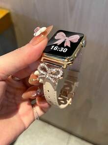 1件女款/男款玫瑰金鑲嵌立方鋯石金屬蝴蝶結與粉色皮革錶帶，相容於 38/40/41/42/44/45/46/49mm，相容於 Series 11/10/9/8/7/6/5/4/3/2/1/Ultra/SE，適用於腕圍 5.5 至 8 英寸，透氣材質全天舒適，時尚高端的智慧手錶配件 - 星光色玫瑰金扣 - 查看 4