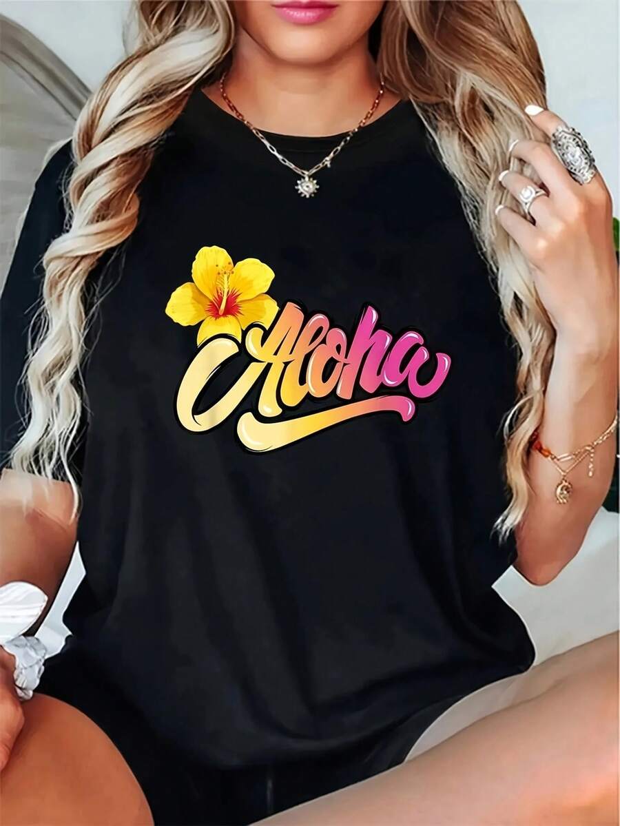 Women's Tropical Aloha T-Shirt - Made With Stretchy Fabric, This Casual Top Features Short Sleeves And A Round Neck, Decorated With Vibrant Floral Prints And Stylish Lettering. It's Machine Washable And Perfect For Spring And Summer. - Black - View 1