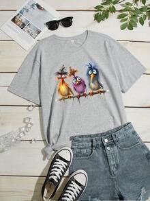 Camiseta de Talla Grande para Mujer con Gráficos de Aves Acuarela Caprichosas - Estilo Urbano en Gris Suave, Cuello Redondo y Manga Corta, Tee Casual Transpirable para Verano y Primavera con Diseño Aleatorio, Camisetas de Pájaros, Confort Diario, Tejido Duradero, Colores Vibrantes - Gris Claro - Ver 6