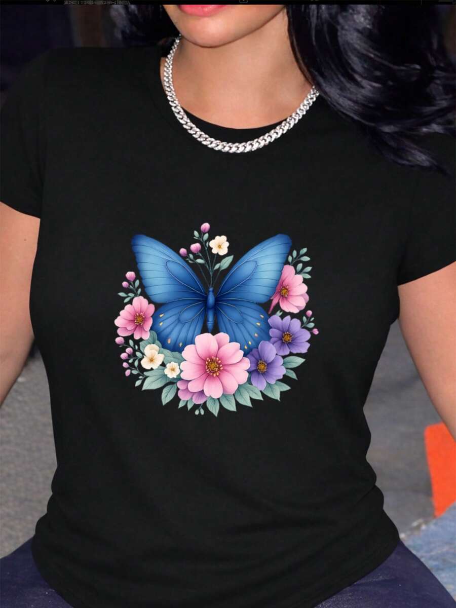Charming Short-Sleeved Blouse Adorned With Bright Blue Butterflies And Floral Motifs, An Exquisite Women's Blouse Suitable For Both Casual And Semi-Formal Occasions. Pair It With Black Leather Pants For A Stylish Look. KN6A - 黑色 - 查看 1