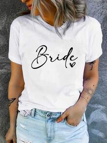 Camiseta Estampada para Mujer Bride con Texto Cursivo Negro - Camiseta Casual de Manga Corta y Cuello Redondo, Corte Relajado para Todas las Estaciones, Perfecta para Uso Diario o Atuendos de Vacaciones (Lavable aáquina). Combínala con Shorts de Mezclilla para un Look Elegante y Divertido. - Blanco - Ver 7