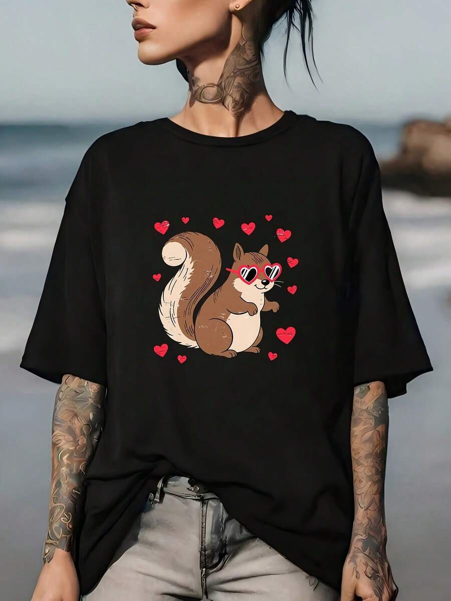 Camiseta Premium para Mujer con Diseño de Ardilla y Corazón - Divertido Regalo para las Fiestas - Camiseta Suave de 180G - Ideal para la Familia, Trabajo y Actividades de Team Building - Top de Verano Cómodo y Resistente a las Arrugas, Apto para Todas las Ocasiones, Ecológico - Negro - Ver 1