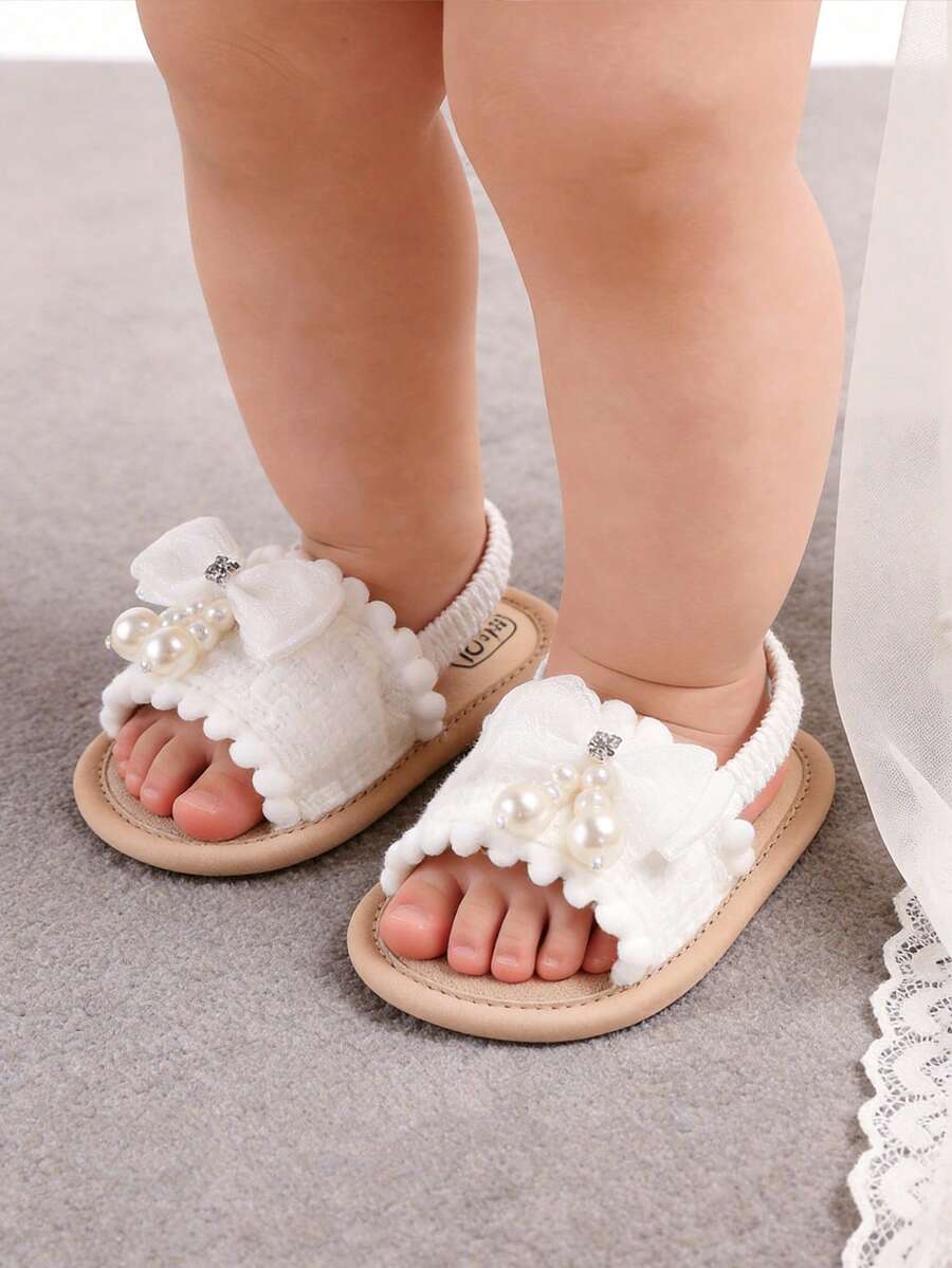 Giày sandal mùa hè cho bé gái sơ sinh, đế mềm, có nơ hoa, thích hợp cho đám cưới hoặc tập đi, giày tập đi cho bé từ 3-18 tháng tuổi.