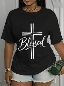 Camiseta Estampada para Mujer - Camiseta Casual Negra de Manga Corta y Cuello Redondo con Cruz Blanca y Texto Bendecido. Con un Corte Relajado para Todas las Estaciones, la Elección Perfecta Tanto para el Uso Diario como para tus Atuendos de Vacaciones (Lavable aáquina). - Negro - Ver 1