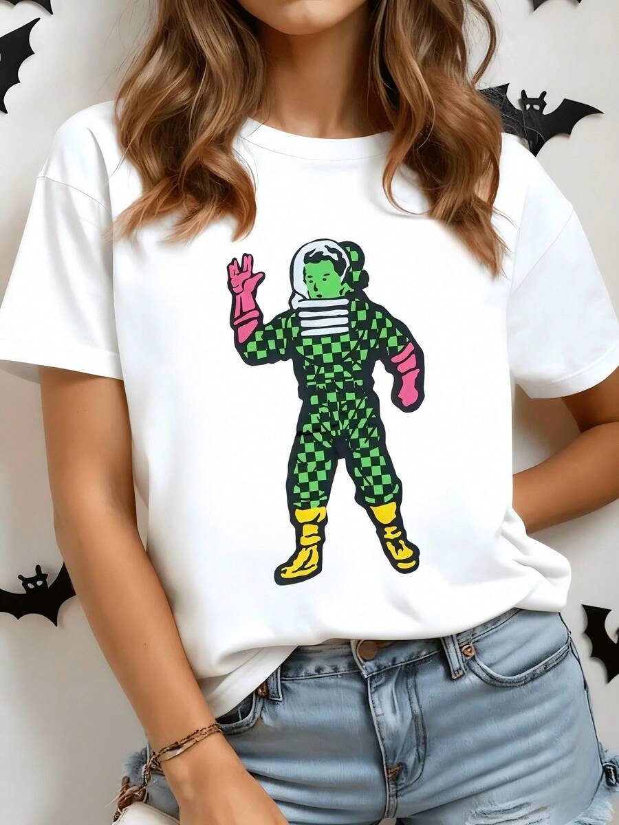 Astronaut Figure In Green Plaid Suit And Pink Gloves Waving In A Friendly Pose, Evoking A Cheerful Cosmic Adventure. Modern, Comfortable Casual Women's T-Shirt - 白色 - 查看 1