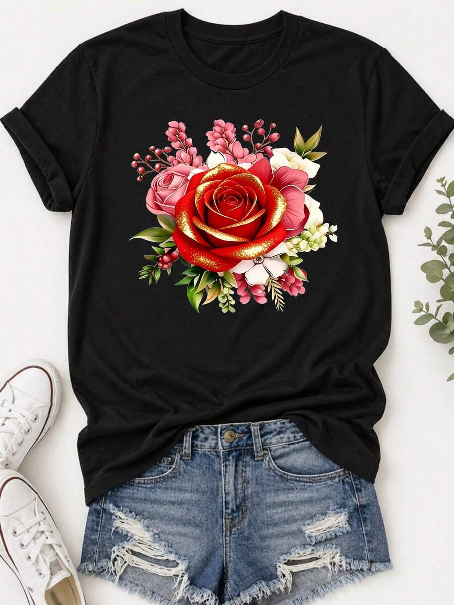 Camiseta Estampada para Mujer - Camiseta Casual Negra de Manga Corta y Cuello Redondo con Vibrante Diseño Floral. Con un Corte Relajado para Todas las Estaciones, la Elección Perfecta Tanto para el Uso Diario como para tus Atuendos de Vacaciones (Lavable aáquina). Se combina perfectamente con Pantalones Cortos Desgastados. - Negro - Ver 1