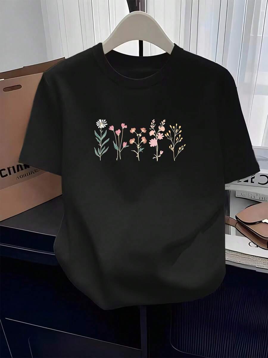 Camiseta Casual Premium para Mujer: Nueva y moderna camiseta casual cómoda y versátil para el día a día, de manga corta - Diseño de cuello redondo, estampado artístico sencillo y ecológico. - Negro - Ver 1