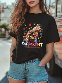 Unique T-Shirt With A Colorful Giraffe Design And The Positive Message "OK I'm Different". Y2K Style, Ideal For Highlighting Your Personality On Any Occasion. Perfect For Lovers Of Fashion And Originality. Available In All Sizes. Combines Comfort And Style In One Product. CG1O - 黑色 - 查看 7