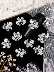 10pcs Of New Charming Silver Alloy Base Gemstone Rhinestone Butterfly Nail Decoration Design Accessories, Luxurious And Elegant Nail Accessories, Japanese And Korean Y2K Style Minimalist And Versatile Nail Art, Phone Case Products, Fragrance Free Handmade DIY Shiny Rhinestone Butterfly Accessories, Suitable For Multifunctional DIY Nail Accessories, Short Nails, French Nail Art, Duckbill Nail Art Products, Nail Gems, Nail Accessories. - Silver - View 1